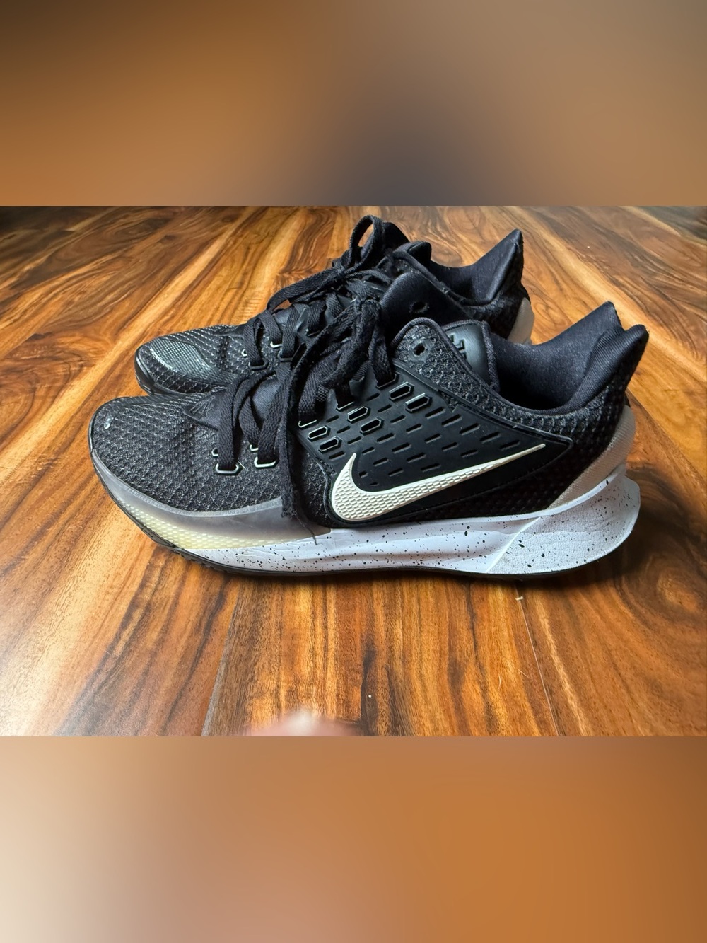 Nike Kyrie Low 2 sneakers in a black and white colorway.